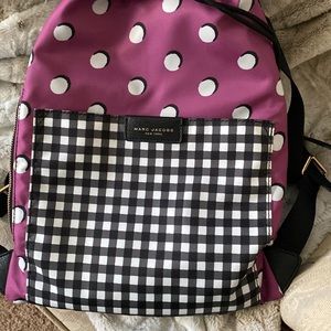 Marc Jacobs draw string multi pattern backpack.